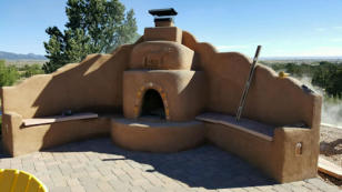 Kiva and bancos by Rising Sun Landscaping & Maintenance